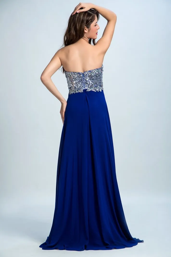 ---Online ceremony dress in royal blue color with sweetheart neckline and many decorations of sparkling stones on the bodice--