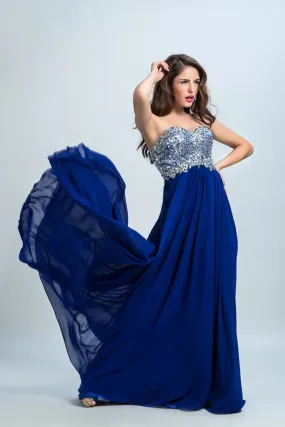 ---Online ceremony dress in royal blue color with sweetheart neckline and many decorations of sparkling stones on the bodice--