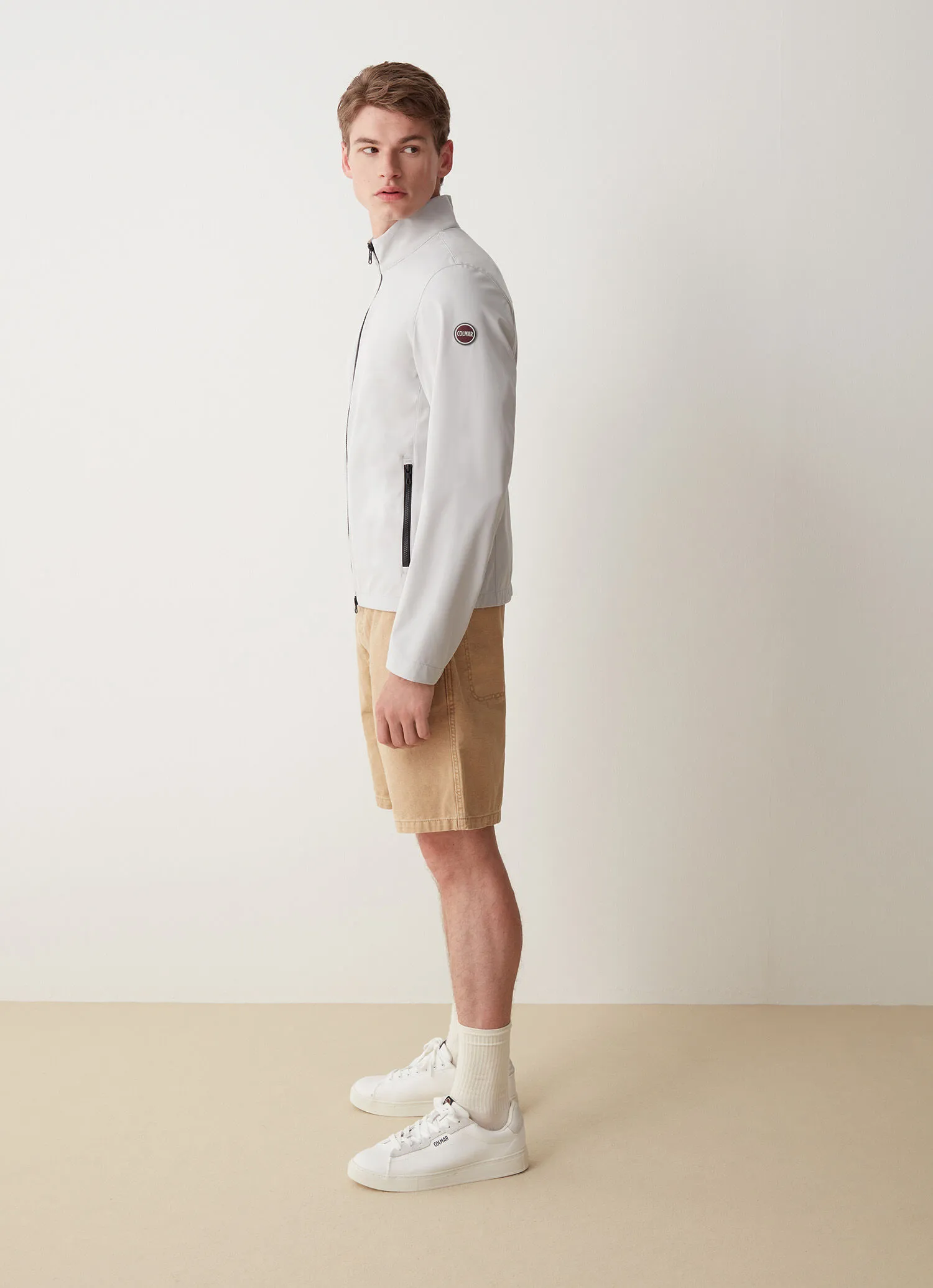 Softshell jacket with adjustment at the hem