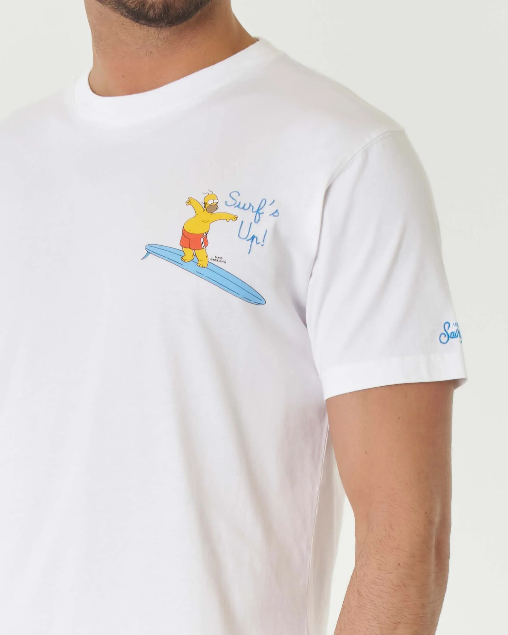 T-shirt bianca mezza manica con stampa Homer surfista piccola sul petto